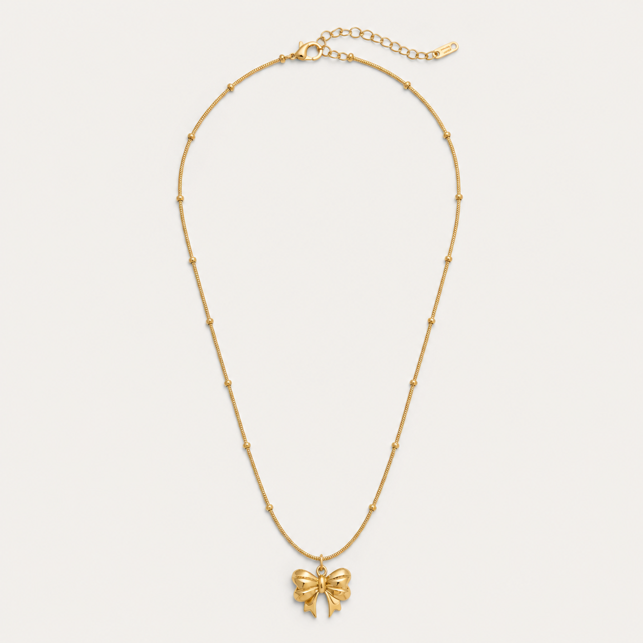 Gold Bow Pendant Necklace